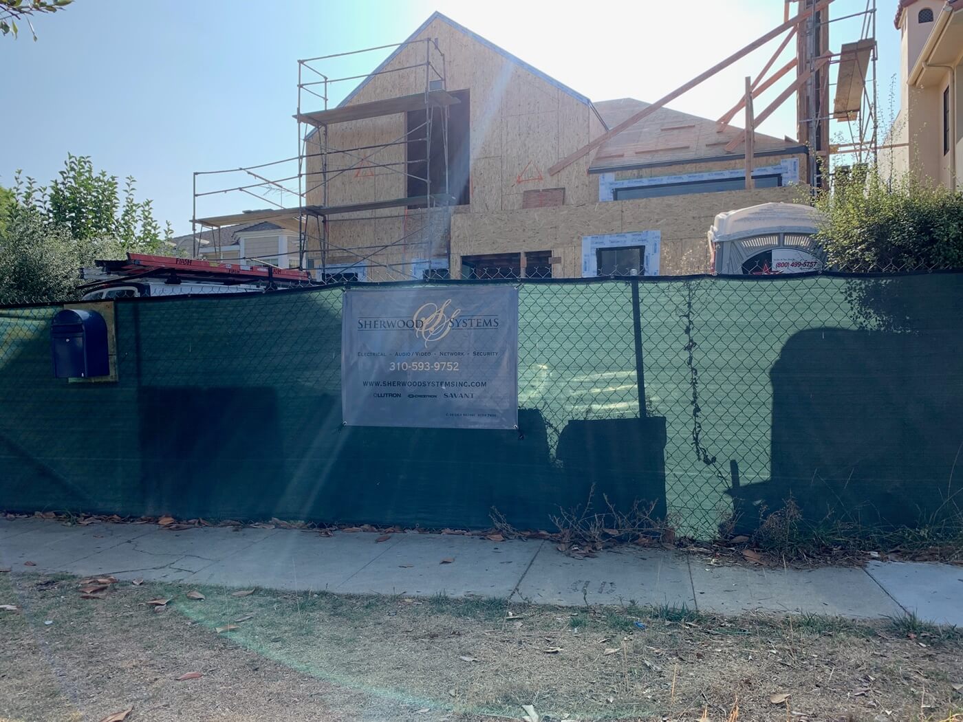 A Sherwood Systems banner outside a property under construction